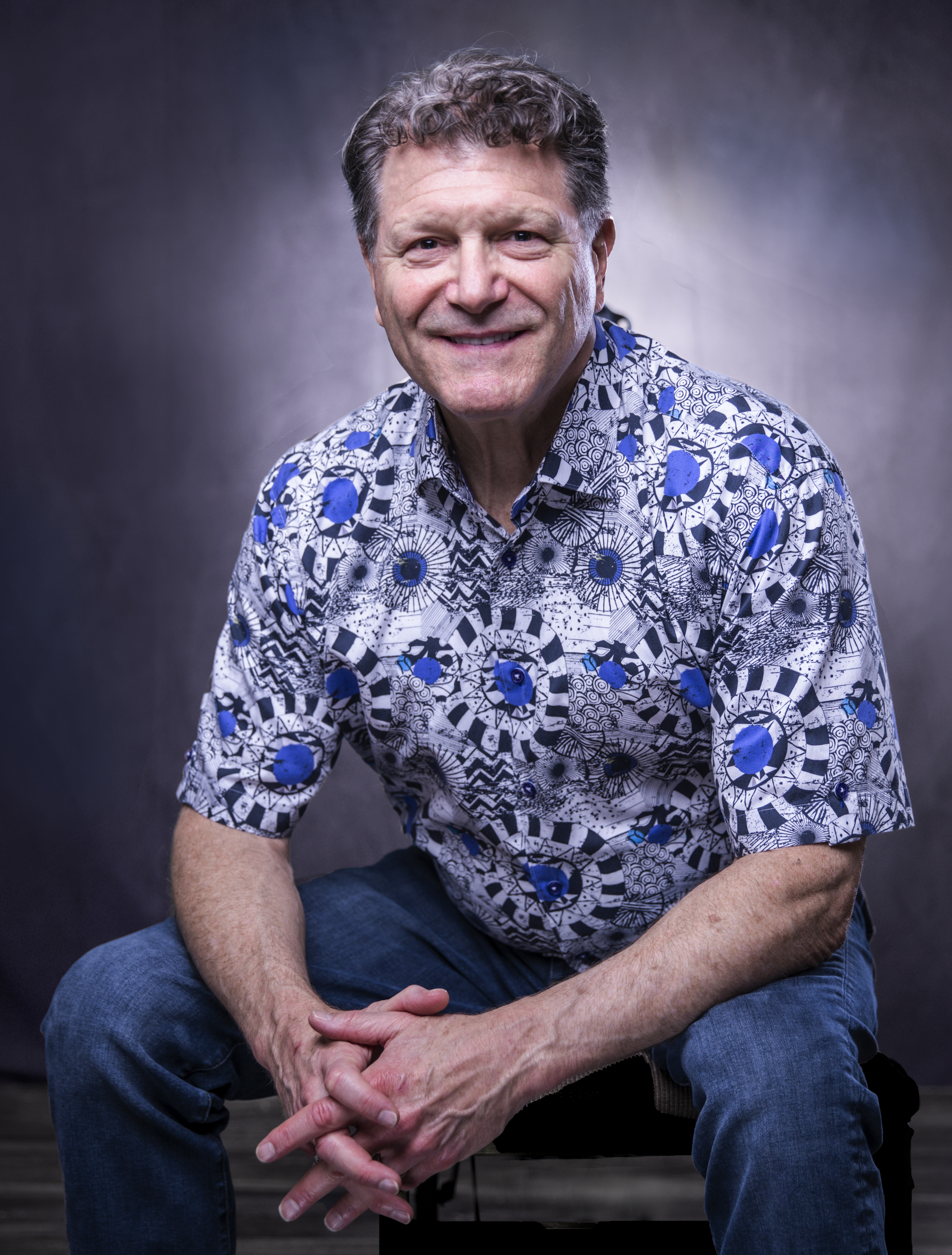 Client portrait photographed with intentional lighting and composition